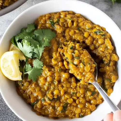 Mung bean curry served in a bowl with spices and coconut, perfect for healthy meals.